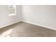 Simple bedroom with tile flooring and large window at 3425 Dryden St, North Port, FL 34288