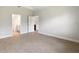 Spacious bedroom with tile flooring and access to bathroom at 3425 Dryden St, North Port, FL 34288