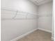 Spacious closet with wire shelving and tile floor at 3425 Dryden St, North Port, FL 34288