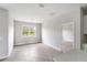 Bright dining room with tile floors and a window view at 3425 Dryden St, North Port, FL 34288