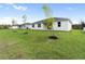 House exterior showcasing a modern design and landscaping at 3425 Dryden St, North Port, FL 34288