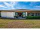 Spacious backyard with open patio and views to the tranquil pond at 3663 Muirfield Dr # 4B, Sarasota, FL 34238