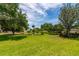 This lush green lawn with picnic tables and community grills is ideal for a community get together at 3663 Muirfield Dr # 4B, Sarasota, FL 34238