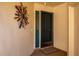 Inviting entrance with a decorative sunburst, leading into the home's interior at 3663 Muirfield Dr # 4B, Sarasota, FL 34238