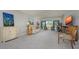 Bright and airy living room with neutral tones and tranquil water views at 3663 Muirfield Dr # 4B, Sarasota, FL 34238