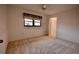 Bright bedroom with a large window and a walk-in closet at 3947 Country View Dr, Sarasota, FL 34233