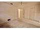 Bright bedroom featuring carpet and ample closet space at 3947 Country View Dr, Sarasota, FL 34233