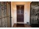 Elegant dark brown front door with ornate detailing at 3947 Country View Dr, Sarasota, FL 34233