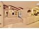 Open kitchen with breakfast bar and view of the pool at 3947 Country View Dr, Sarasota, FL 34233