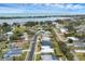 Aerial view of waterfront homes and neighborhood at 404 Bayside Ln, Nokomis, FL 34275
