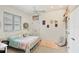 Charming bedroom with a full-size bed and built-in workspace at 404 Bayside Ln, Nokomis, FL 34275