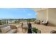 Spacious balcony boasting ocean views and comfortable seating at 415 L Ambiance Dr # C204, Longboat Key, FL 34228