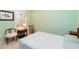 Charming bedroom with light green walls and window at 5050 Maymont Park, Bradenton, FL 34203