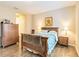Bright bedroom featuring a wooden bed frame and ample closet space at 5050 Maymont Park, Bradenton, FL 34203