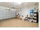 Attached garage with epoxy flooring and ample storage shelving at 5050 Maymont Park, Bradenton, FL 34203
