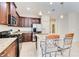 Kitchen boasts granite countertops and stainless steel appliances at 5050 Maymont Park, Bradenton, FL 34203