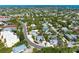 Wide aerial view of a neighborhood with a highlighted house at 5613 Gulf Dr, Holmes Beach, FL 34217