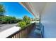 Relaxing balcony with ocean views and comfortable seating at 5613 Gulf Dr, Holmes Beach, FL 34217