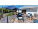 Relaxing deck with comfortable seating and ocean views at 5613 Gulf Dr, Holmes Beach, FL 34217