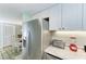 Stainless steel appliances and granite countertops in this kitchen at 5613 Gulf Dr, Holmes Beach, FL 34217