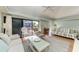Living room with access to a balcony and ocean view at 5613 Gulf Dr, Holmes Beach, FL 34217