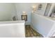 Staircase with tiled flooring leading to the upper level at 5613 Gulf Dr, Holmes Beach, FL 34217