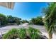 Oceanfront property with lush landscaping and a quiet street at 5613 Gulf Dr, Holmes Beach, FL 34217