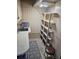 Unfinished basement with shelving, sink and stool at 5619 Bayshore Rd # 115, Palmetto, FL 34221