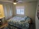 Bedroom with a queen-size bed and built-in closet at 5619 Bayshore Rd # 115, Palmetto, FL 34221