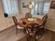 Round dining table with four chairs in the dining area at 5619 Bayshore Rd # 115, Palmetto, FL 34221