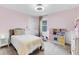 Charming bedroom with a twin-size bed and playful decor at 5726 Aaron Ct, Sarasota, FL 34232