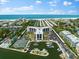 Aerial view of waterfront property with marina at 5855 Midnight Pass Rd # 311, Sarasota, FL 34242