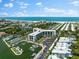 Aerial view of waterfront property with marina at 5855 Midnight Pass Rd # 311, Sarasota, FL 34242