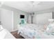 Bedroom with a queen bed and ceiling fan at 5855 Midnight Pass Rd # 311, Sarasota, FL 34242