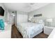 Bedroom with queen bed and access to bathroom at 5855 Midnight Pass Rd # 311, Sarasota, FL 34242