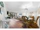 Bright living room with hardwood floors, comfortable seating, and dining area at 5855 Midnight Pass Rd # 311, Sarasota, FL 34242
