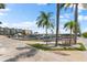 Scenic walkway with marina views and boat slips at 5855 Midnight Pass Rd # 311, Sarasota, FL 34242