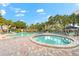 Refreshing swimming pool with a separate kiddie pool and plenty of lounge chairs at 5855 Midnight Pass Rd # 311, Sarasota, FL 34242