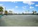 Two well-maintained tennis courts at 5855 Midnight Pass Rd # 311, Sarasota, FL 34242