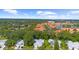 Aerial view of community, showcasing homes and lush landscape at 5916 Bonaventure Pl, Sarasota, FL 34243