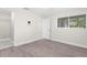 Bright bedroom with wood-look floors and ample closet space at 5916 Bonaventure Pl, Sarasota, FL 34243