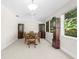 Spacious dining area includes a wood table, chairs, and built-in hutches at 5916 Bonaventure Pl, Sarasota, FL 34243
