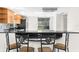 Modern kitchen with stainless steel appliances and wood cabinets at 5916 Bonaventure Pl, Sarasota, FL 34243