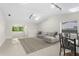 Spacious living room with vaulted ceilings, skylights, and a comfortable sectional sofa at 5916 Bonaventure Pl, Sarasota, FL 34243
