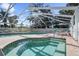 Community pool and spa with ample lounge chairs at 5916 Bonaventure Pl, Sarasota, FL 34243