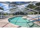 Relaxing community pool area with spa and covered seating at 5916 Bonaventure Pl, Sarasota, FL 34243
