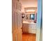 Bright bathroom with updated vanity and tiled floor at 6033 34Th W St # 138, Bradenton, FL 34210