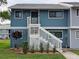 Inviting condo exterior with stairs and landscaping at 6033 34Th W St # 138, Bradenton, FL 34210