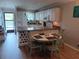 Well-equipped kitchen with granite counters and eat-in area at 6033 34Th W St # 138, Bradenton, FL 34210
