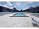 Community pool with plenty of lounge chairs at 6033 34Th W St # 138, Bradenton, FL 34210